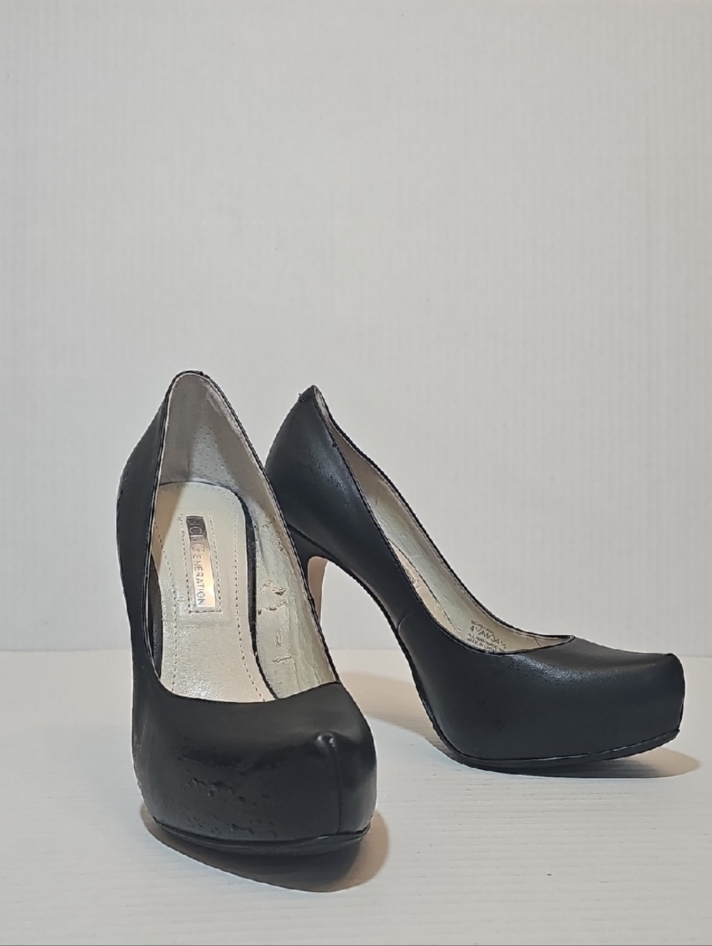 BCBGeneration Black Round-Toe Platform Pumps